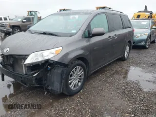 2014 Toyota Sienna XLE with VIN 5TDYK3DC0ES502482, listed as a IAAI auction lot 41910683 with 151,330 mi miles. Bid and sale history available at carsss.com. Image 19.