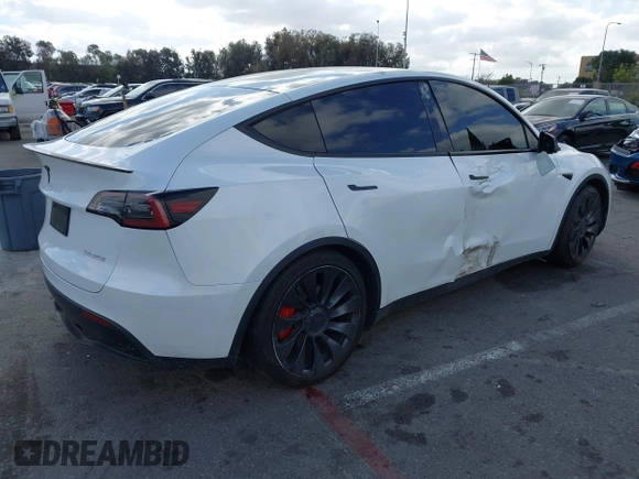2022 Tesla Model Y Performance with VIN 7SAYGDEF1NF559572, listed as a IAAI auction lot 41516070 with 43,240 mi miles and . Bid and sale history available at DreamBid. Image 4.