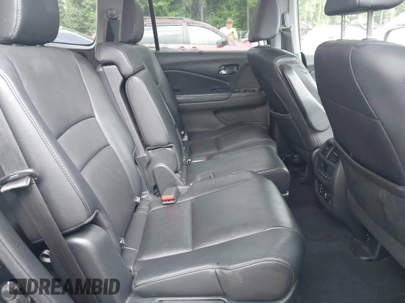 2017 Honda Pilot Touring with VIN 5FNYF5H99HB037126, listed as a IAAI auction lot 42275048 with 164,289 mi miles and . Bid and sale history available at DreamBid. Image 8.