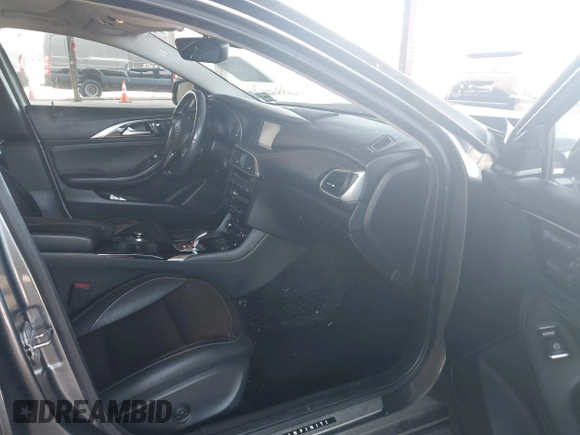 2018 Infiniti QX30 Luxury with VIN SJKCH5CR8JA002357, listed as a IAAI auction lot 42117409 with 103,034 mi miles and . Bid and sale history available at DreamBid. Image 5.