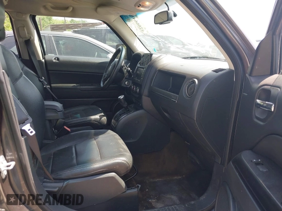 2016 Jeep Patriot Latitude with VIN 1C4NJRFB7GD658594, listed as a IAAI auction lot 42066483 with 146,492 mi miles. Bid and sale history available at carsss.com. Image 5.