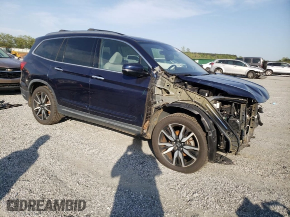 2019 Honda Pilot Touring 8-Passenger z VIN 5FNYF6H90KB000303, wystawiony jako Copart lot #52410585 z przebiegiem 129 190 mil mil oraz Szkoda całkowita • Salvage title. Historia ofert i sprzedaży dostępna na DreamBid. Obrazek 4.