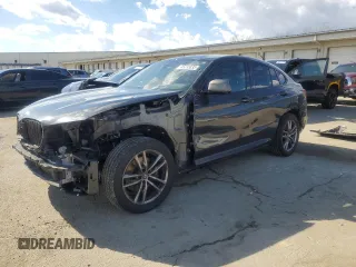 2020 BMW X4 M40i with VIN 5UX2V5C09L9B06077, listed as a Copart auction lot 45233835 with 47,205 mi miles and Salvage Title. Bid and sale history available at carsss.com. Image 1.