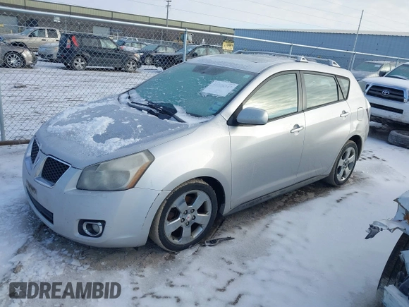 2009 Pontiac Vibe with VIN 5Y2SM67069Z453831, listed as a IAAI auction lot 41526347 with 163,468 mi miles. Bid and sale history available at carsss.com. Image 2.