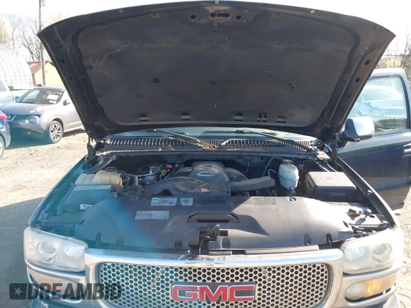 2005 GMC Yukon Denali z VIN 1GKEK63U55J254214, wystawiony jako IAAI lot #42103378 z przebiegiem 131 183 mil mil oraz . Historia ofert i sprzedaży dostępna na DreamBid. Obrazek 10.