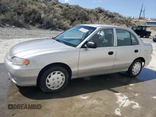 1998 Hyundai Accent z VIN KMHVF24N8WU500040, wystawiony jako Copart lot #52039755 z przebiegiem 103 631 mil mil oraz Szkody całkowita. Historia ofert i sprzedaży dostępna na DreamBid. Obrazek 1.