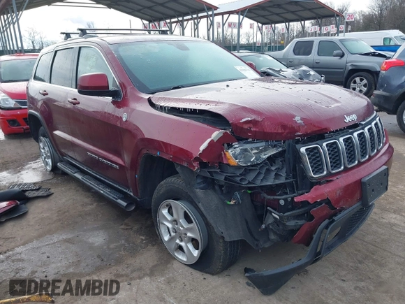 2017 Jeep Grand Cherokee Laredo with VIN 1C4RJFAG1HC844965, listed as a IAAI auction lot 41606739 with 82,144 mi miles. Bid and sale history available at carsss.com. Image 1.