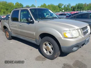 2004 Ford Explorer Sport Trac XLS z VIN 1FMZU77K84UB42473, wystawiony jako IAAI lot #42250857 z przebiegiem Nie podano mil oraz . Historia ofert i sprzedaży dostępna na DreamBid. Obrazek 1.