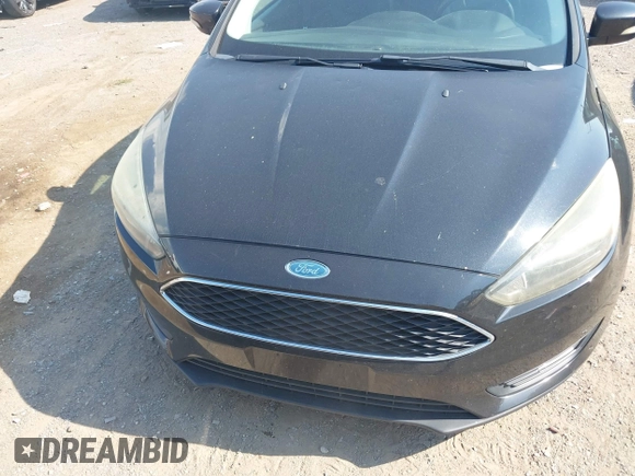 2015 Ford Focus SE z VIN 1FADP3F25FL284097, wystawiony jako IAAI lot #42553323 z przebiegiem 139 647 mil mil oraz . Historia ofert i sprzedaży dostępna na DreamBid. Obrazek 12.