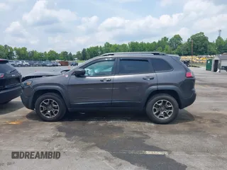 2020 Jeep Cherokee Trailhawk with VIN 1C4PJMBX5LD530720, listed as a IAAI auction lot 42404948 with 99,606 mi miles and . Bid and sale history available at DreamBid. Image 14.