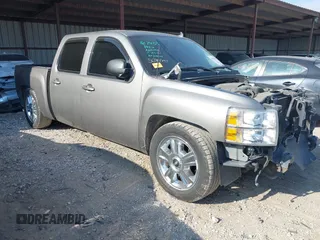 2013 Chevrolet Silverado 1500 LT with VIN 3GCPCSE08DG283985, listed as a IAAI auction lot 40983482 with 118,615 mi miles and . Bid and sale history available at DreamBid. Image 1.