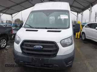 2020 Ford Transit Cargo with VIN 1FTBR1X82LKB60762, listed as a IAAI auction lot 41572948 with 112,050 mi miles and . Bid and sale history available at DreamBid. Image 12.