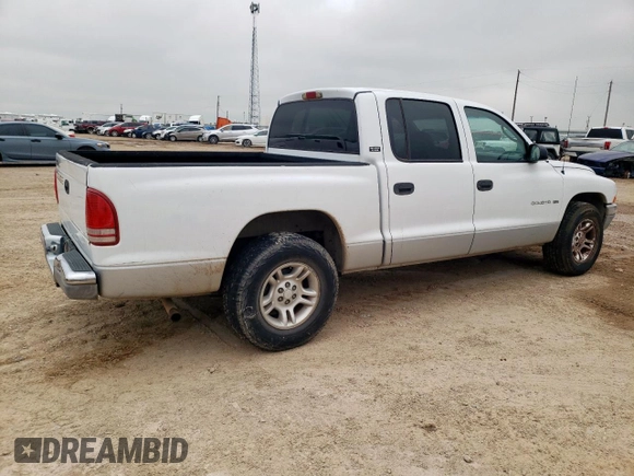 2001 Dodge Dakota Sport z VIN 1B7GL2AN51S118157, wystawiony jako Copart lot #58797325 z przebiegiem 147 765 mil mil oraz Szkoda całkowita • Salvage title. Historia ofert i sprzedaży dostępna na DreamBid. Obrazek 3.