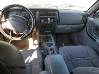 1998 Jeep Cherokee Sport with VIN 1J4FJ68S0WL187922, listed as a Copart auction lot 71319834 with 0 mi miles and Clean Title. Bid and sale history available at carsss.com. Image 8.