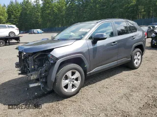 2021 Toyota RAV4 XLE with VIN 2T3P1RFV9MW159667, listed as a Copart auction lot 59019885 with 84,809 mi miles and Salvage title. Bid and sale history available at DreamBid. Image 1.