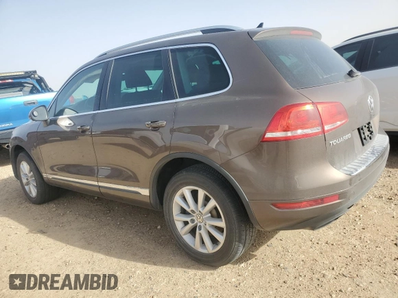 2013 Volkswagen Touareg Exec z VIN WVGEF9BP7DD009467, wystawiony jako Copart lot #47492725 z przebiegiem 109 511 mil mil oraz Szkoda całkowita • Salvage title. Historia ofert i sprzedaży dostępna na DreamBid. Obrazek 2.