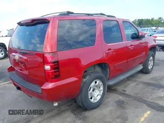 2013 Chevrolet Tahoe LS with VIN 1GNSCAE00DR359498, listed as a IAAI auction lot 40125477 with 156,100 mi miles and . Bid and sale history available at DreamBid. Image 4.