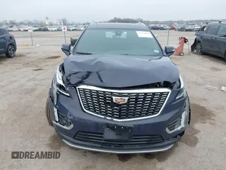 2024 Cadillac XT5 FWD Premium Luxury with VIN 1GYKNCR47RZ755652, listed as a IAAI auction lot 41512069 with 10,243 mi miles. Bid and sale history available at carsss.com. Image 12.