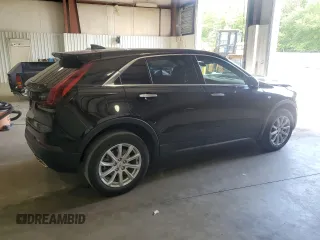 2022 Cadillac XT4 FWD Luxury z VIN 1GYAZAR45NF124737, wystawiony jako Copart lot #53164135 z przebiegiem 41 344 mil mil oraz Szkoda całkowita • Salvage title. Historia ofert i sprzedaży dostępna na DreamBid. Obrazek 3.