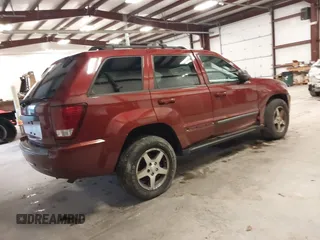 2007 Jeep Grand Cherokee Laredo with VIN 1J8GR48K97C631672, listed as a IAAI auction lot 41520054 with 231,576 mi miles. Bid and sale history available at carsss.com. Image 4.