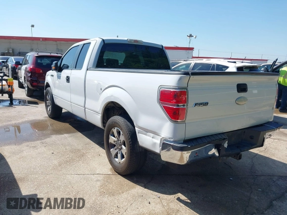 2009 Ford F-150 STX with VIN 1FTRX12W89KC52056, listed as a IAAI auction lot 41982659 with 318,539 mi miles. Bid and sale history available at carsss.com. Image 3.