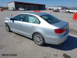2013 Volkswagen Jetta Sedan SE with VIN 3VWDX7AJ2DM255391, listed as a IAAI auction lot 41885635 with 150,610 mi miles. Bid and sale history available at carsss.com. Image 3.