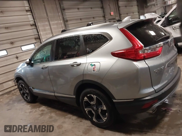 2017 Honda CR-V Touring with VIN 5J6RW2H95HL042012, listed as a IAAI auction lot 41911028 with 93,575 mi miles. Bid and sale history available at carsss.com. Image 15.