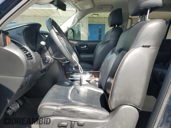 2018 Nissan Armada SL with VIN JN8AY2ND2JX000079, listed as a Copart auction lot 54400655 with 122,115 mi miles and Salvage Title. Bid and sale history available at DreamBid. Image 7.