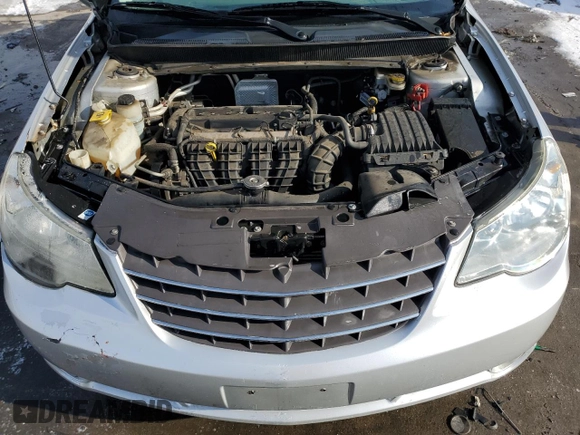 2007 Chrysler Sebring Limited z VIN 1C3LC66K07N548825, wystawiony jako Copart lot #45142015 z przebiegiem 240 543 mil mil oraz Szkoda całkowita • Salvage title. Historia ofert i sprzedaży dostępna na DreamBid. Obrazek 11.