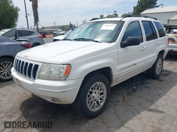 2002 Jeep Grand Cherokee Limited with VIN 1J4GX58S52C305020, listed as a IAAI auction lot 42025324 with 214,214 mi miles and . Bid and sale history available at DreamBid. Image 2.