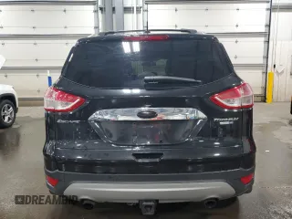 2015 Ford Escape Titanium with VIN 1FMCU9J96FUA43340, listed as a Copart auction lot 55756395 with 142,039 mi miles and Salvage Title. Bid and sale history available at DreamBid. Image 6.