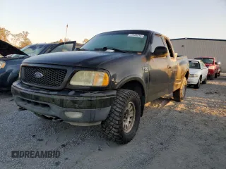 2002 Ford F-150 XL with VIN 2FTRX08L72CA44252, listed as a Copart auction lot 77344214 with 255,001 mi miles and Clean title. Bid and sale history available at DreamBid. Image 1.
