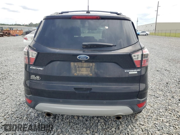 2017 Ford Escape Titanium with VIN 1FMCU0JD5HUB95239, listed as a Copart auction lot 55458405 with 106,193 mi miles and Clean Title. Bid and sale history available at carsss.com. Image 6.