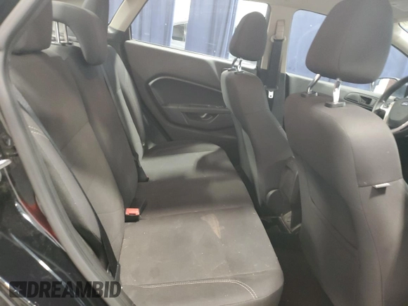2019 Ford Fiesta SE z VIN 3FADP4BJ9KM151046, wystawiony jako Copart lot #56862255 z przebiegiem 77 002 mil mil oraz Czysty tytuł • Clean title. Historia ofert i sprzedaży dostępna na DreamBid. Obrazek 10.