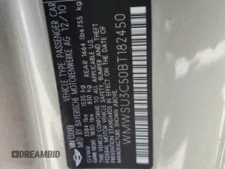 2011 MINI Hardtop with VIN WMWSU3C50BT182450, listed as a Copart auction lot 48638415 with 119,471 mi miles and Clean Title. Bid and sale history available at DreamBid. Image 12.