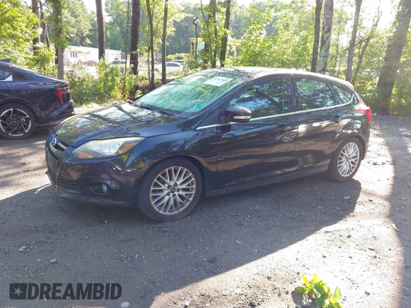 2014 Ford Focus Titanium z VIN 1FADP3N28EL166187, wystawiony jako IAAI lot #42553868 z przebiegiem 189 470 mil mil oraz . Historia ofert i sprzedaży dostępna na DreamBid. Obrazek 2.