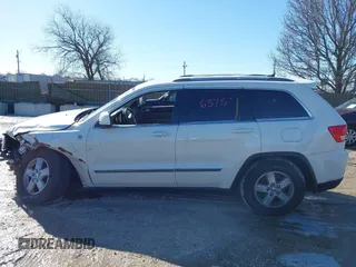 2012 Jeep Grand Cherokee Laredo with VIN 1C4RJFAGXCC224138, listed as a IAAI auction lot 41736375 with 133,383 mi miles. Bid and sale history available at carsss.com. Image 15.