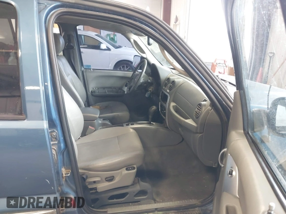 2004 Jeep Liberty Limited with VIN 1J4GK58K84W226666, listed as a IAAI auction lot 41764238 with 148,664 mi miles. Bid and sale history available at carsss.com. Image 5.