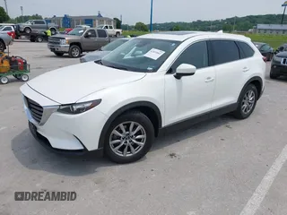 2019 Mazda CX-9 Touring with VIN JM3TCACY1K0334804, listed as a IAAI auction lot 42411662 with 49,447 mi miles and . Bid and sale history available at DreamBid. Image 2.