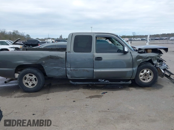 2002 GMC Sierra 1500 SLE z VIN 2GTEC19T121214213, wystawiony jako IAAI lot #41317517 z przebiegiem 209 031 mil mil oraz . Historia ofert i sprzedaży dostępna na DreamBid. Obrazek 13.