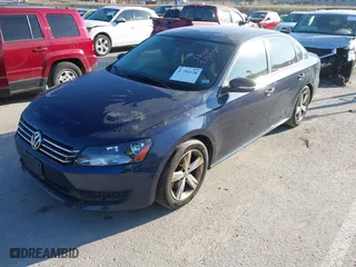 2013 Volkswagen Passat SE with VIN 1VWBP7A3XDC106575, listed as a IAAI auction lot 41856366 with 216,897 mi miles. Bid and sale history available at carsss.com. Image 2.