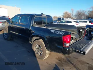 2016 Toyota Tacoma SR with VIN 3TMCZ5AN0GM023263, listed as a IAAI auction lot 41302069 with 137,276 mi miles and . Bid and sale history available at DreamBid. Image 3.