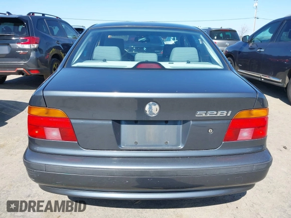 2000 BMW 5 Series 528iA with VIN WBADM6343YGV01651, listed as a IAAI auction lot 41745574 with 143,898 mi miles. Bid and sale history available at carsss.com. Image 16.