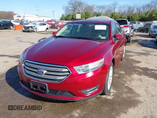 2013 Ford Taurus SEL with VIN 1FAHP2E87DG168603, listed as a IAAI auction lot 41942917 with 161,293 mi miles. Bid and sale history available at carsss.com. Image 2.