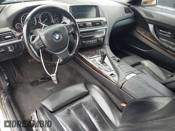 2012 BMW 6 Series 650i z VIN WBALZ3C52CC397545, wystawiony jako Copart lot #55976625 z przebiegiem 147 352 mil mil oraz Tytuł czysty. Historia ofert i sprzedaży dostępna na DreamBid. Obrazek 8.