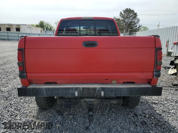 2000 Dodge 2500 with VIN 1B7KF23Z6YJ187490, listed as a Copart auction lot 57873375 with 238,769 mi miles and Salvage title. Bid and sale history available at DreamBid. Image 6.