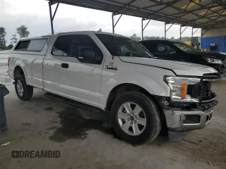 2018 Ford F-150 XL с VIN 1FTFX1CG1JKC67352, выставлен на аукционе Copart как лот 59598515 с пробегом 177 437 миль миль и Списание • Salvage title. История ставок и продаж доступна на DreamBid. Изображение 4.
