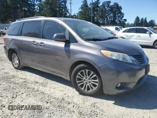 2015 Toyota Sienna XLE with VIN 5TDYK3DC7FS630252, listed as a Copart auction lot 65182965 with 90,764 mi miles and Salvage title. Bid and sale history available at DreamBid. Image 4.