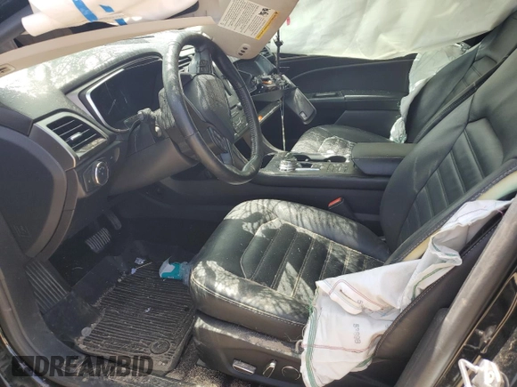 2017 Ford Fusion Hybrid SE с VIN 3FA6P0LU4HR252582, выставлен на аукционе Copart как лот 57965815 с пробегом Не указан миль и Списание • Salvage title. История ставок и продаж доступна на DreamBid. Изображение 7.