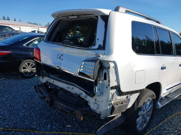2010 Lexus LX 570 with VIN JTJHY7AX0A4049402, listed as a IAAI auction lot 40459872 with 118,942 mi miles. Bid and sale history available at carsss.com. Image 6.
